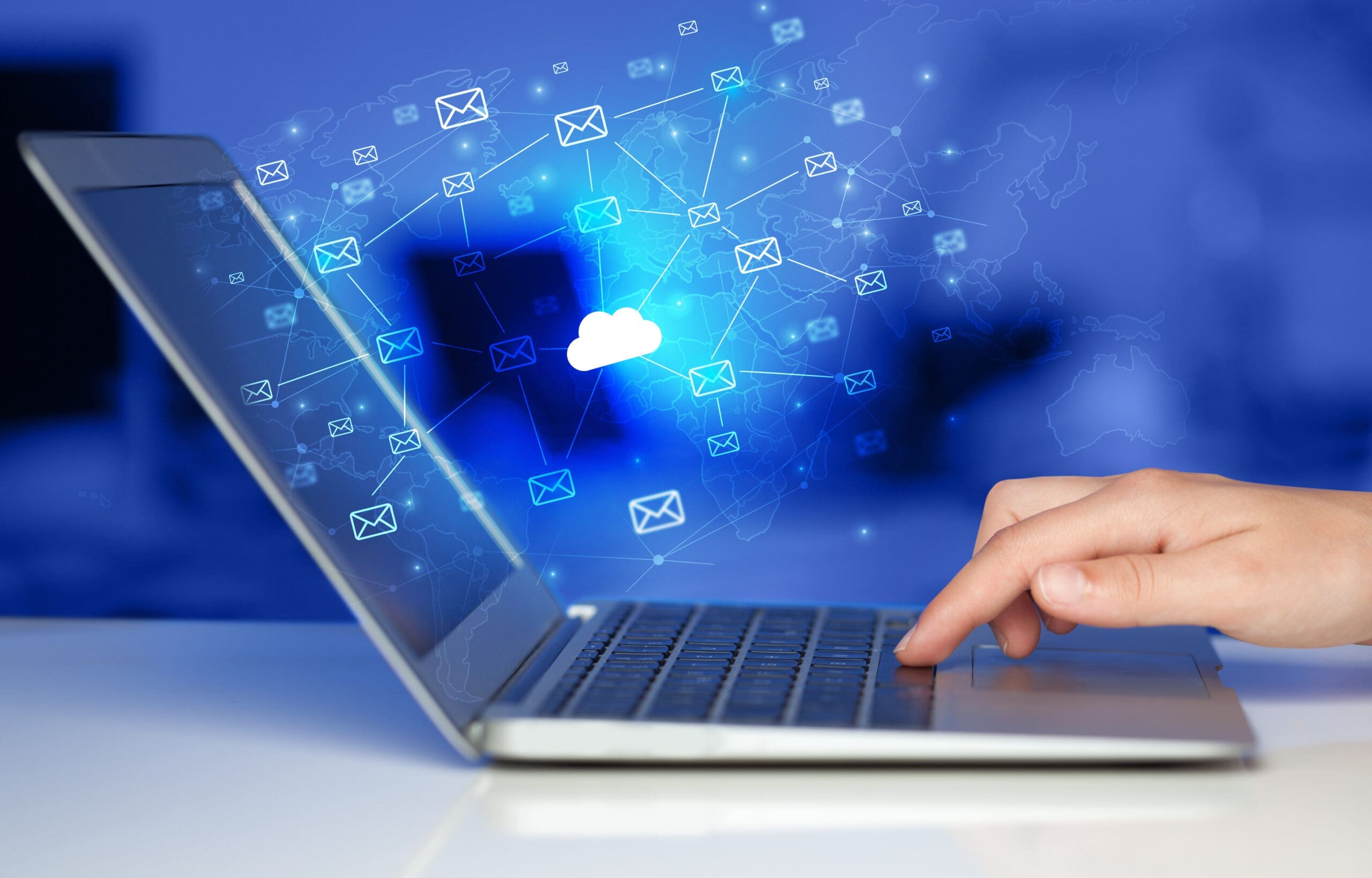 Hand using laptop with centralized cloud computing system concept