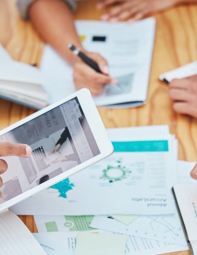 Marketing or advertising team with a tablet planning online with collaboration for creative ideas a